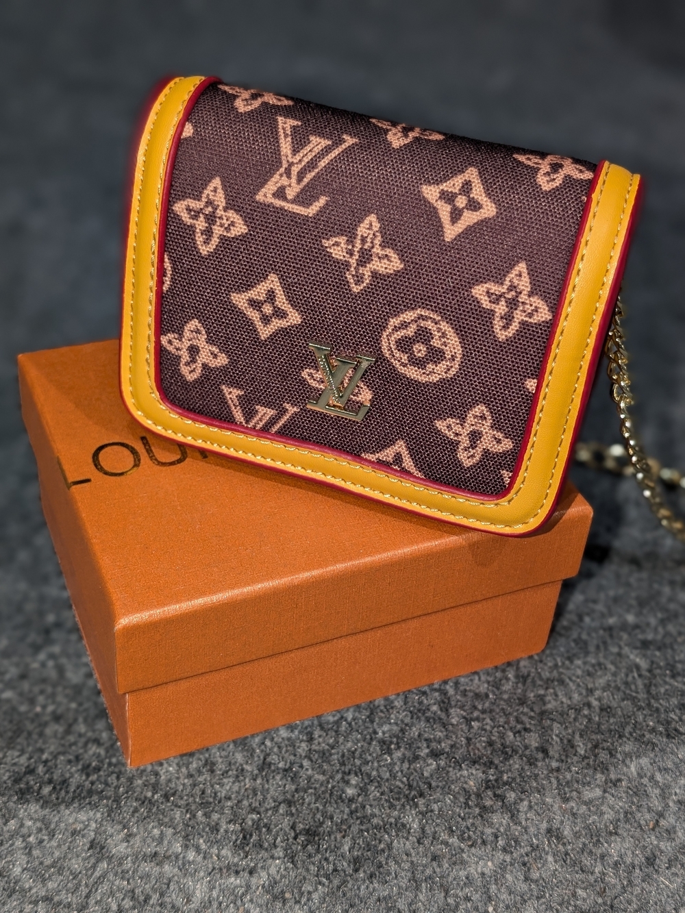 Fashion Inspired Brown Monogram Mini Bag with Yellow and Red Trim